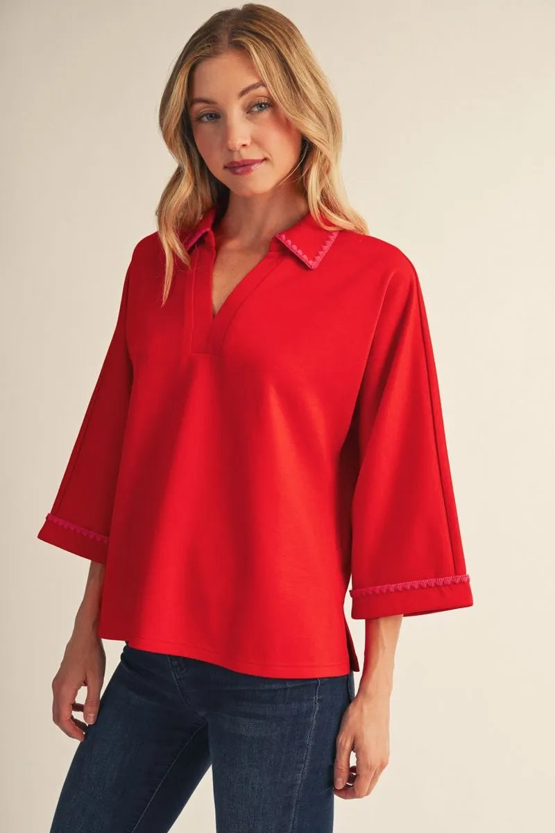 embroidered scallop edge detail top