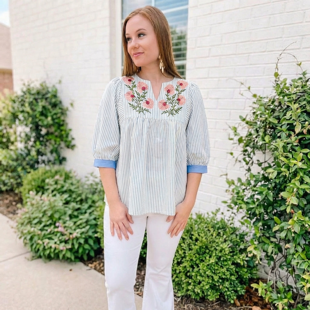 striped blue and white embroidered top