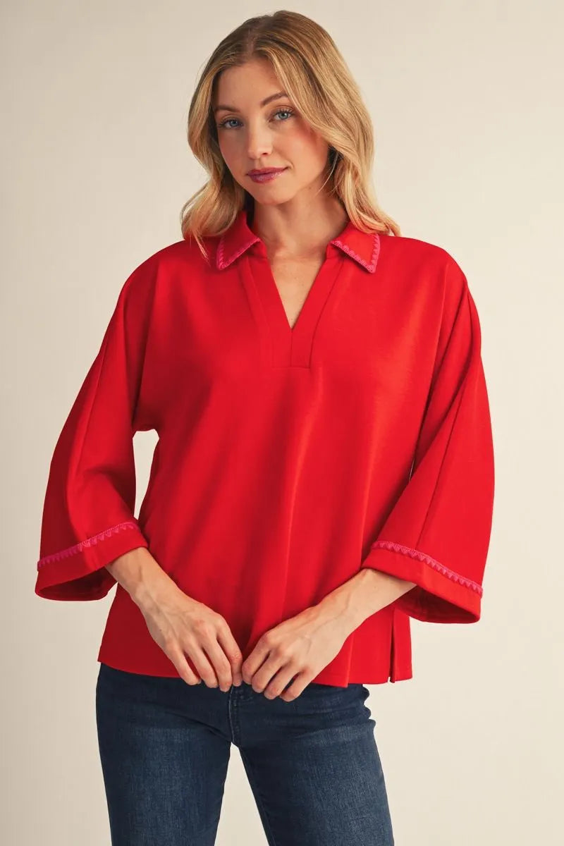 embroidered scallop edge detail top
