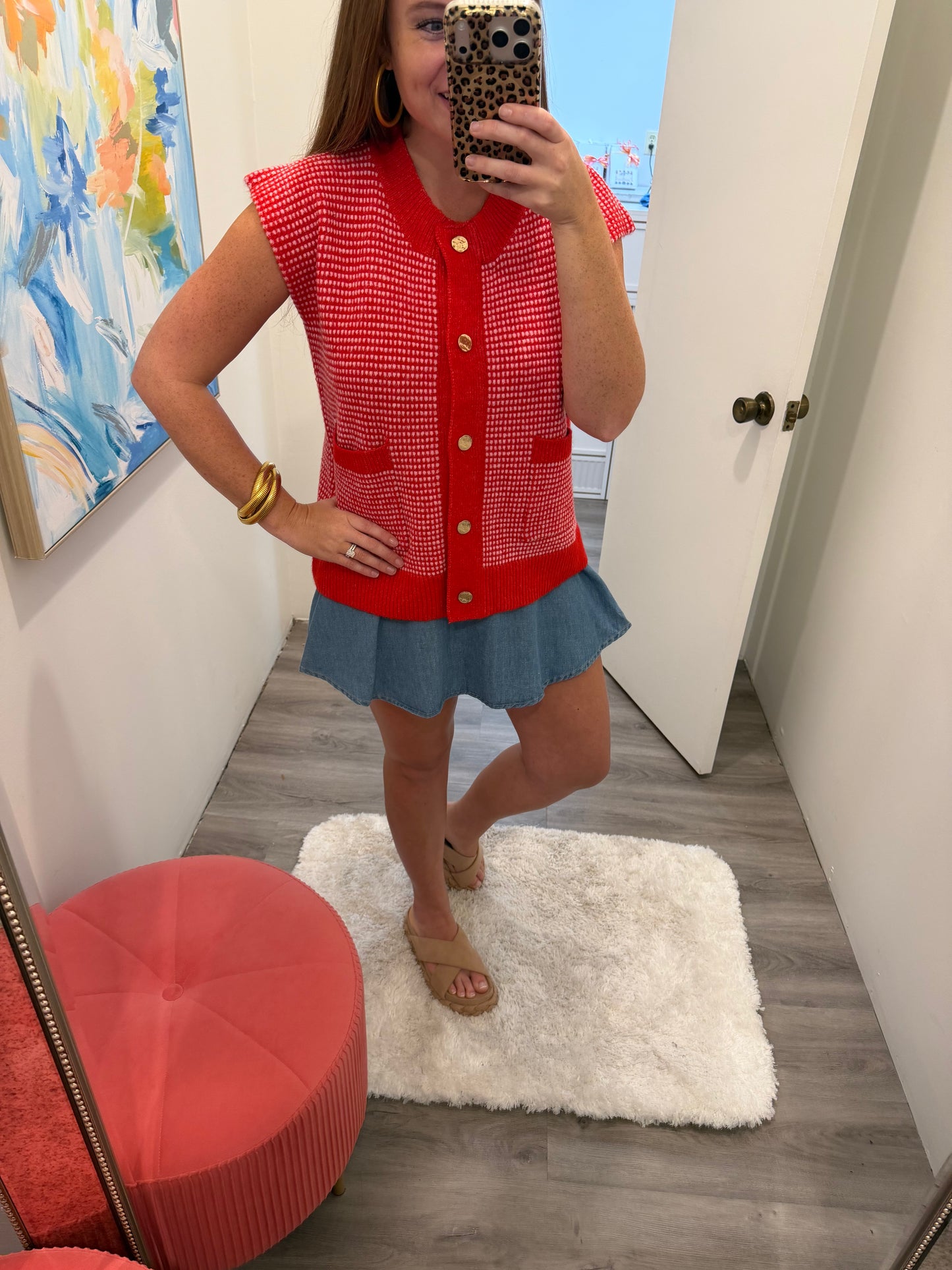 red and pink sweater vest with gold buttons