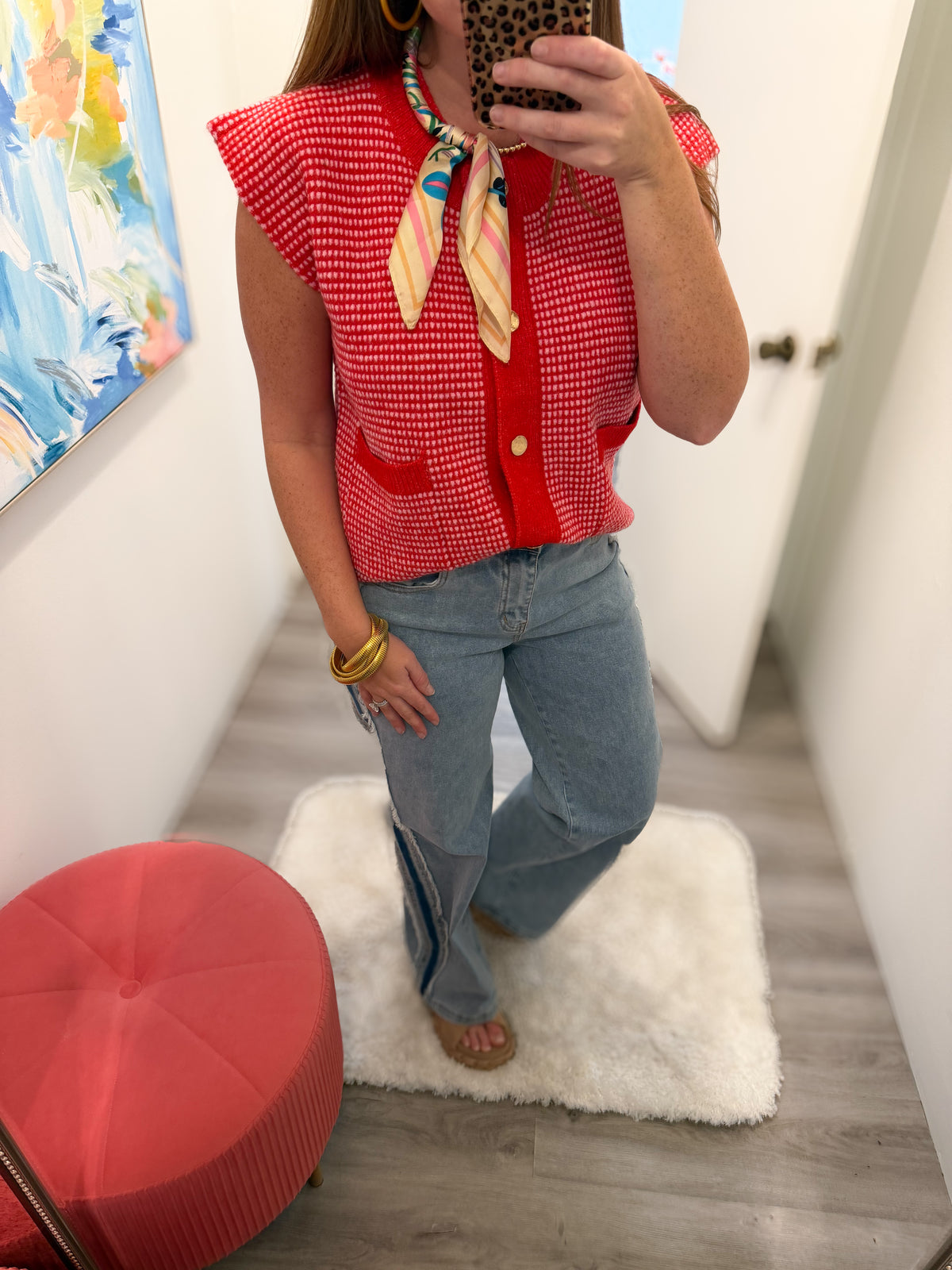 red and pink sweater vest with gold buttons