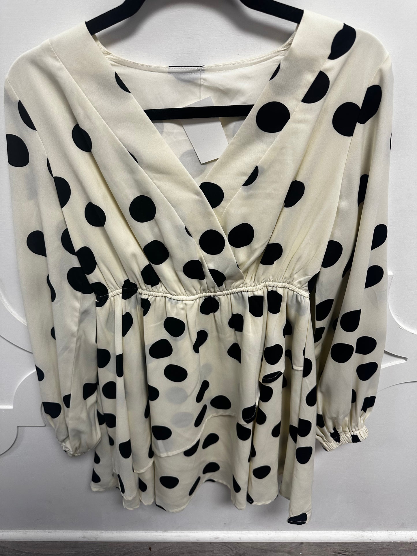 white and black polka dot dress