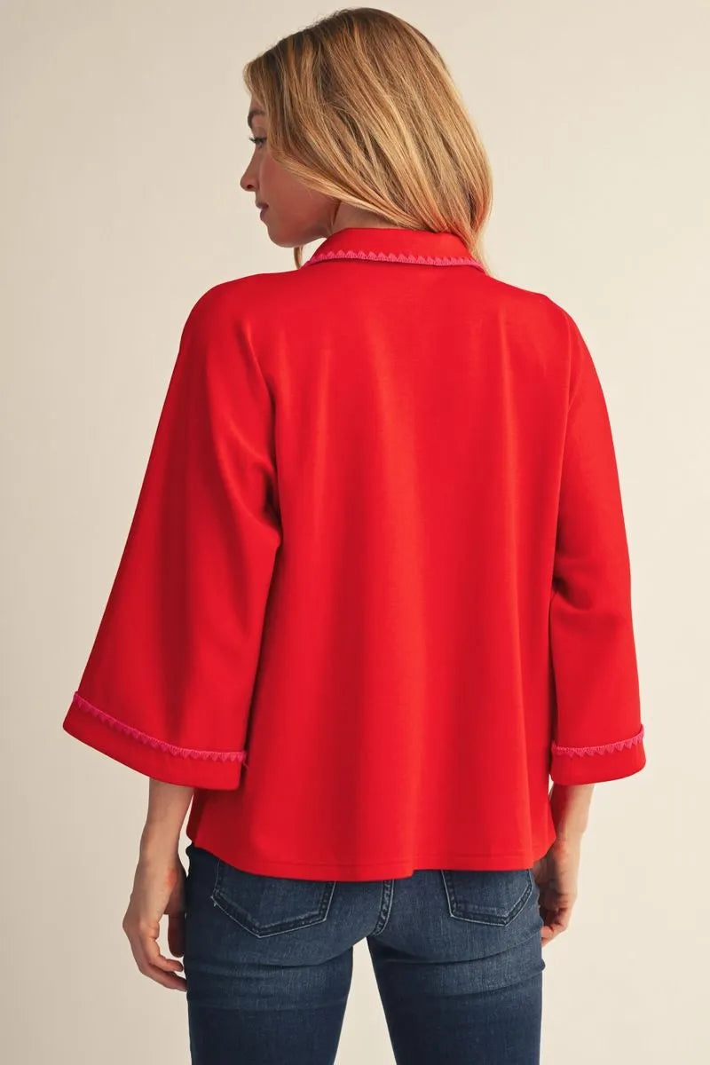 embroidered scallop edge detail top